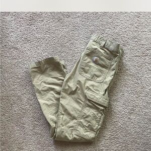Tan straight leg carhartt cargo pants with paint stains